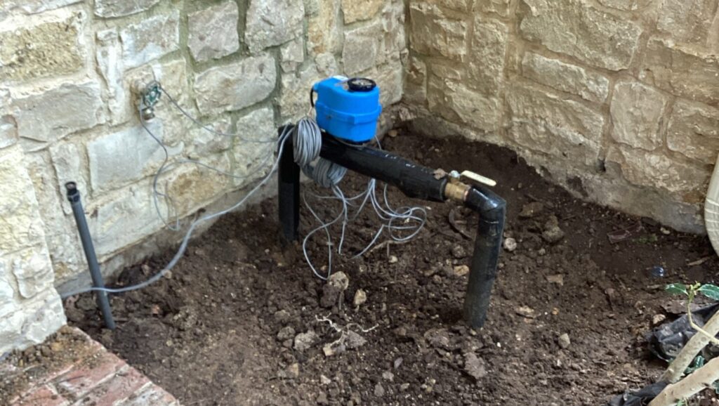 Outside Install e1743178228443 - Water damage can sneak up on you. One small leak behind a wall or under a floor can lead to serious repairs—not to mention mold, wood rot, and sky-high water bills. It's no surprise homeowners are looking for smarter ways to stay ahead of it. One of the most reliable solutions we recommend is an automatic emergency shutoff device.
