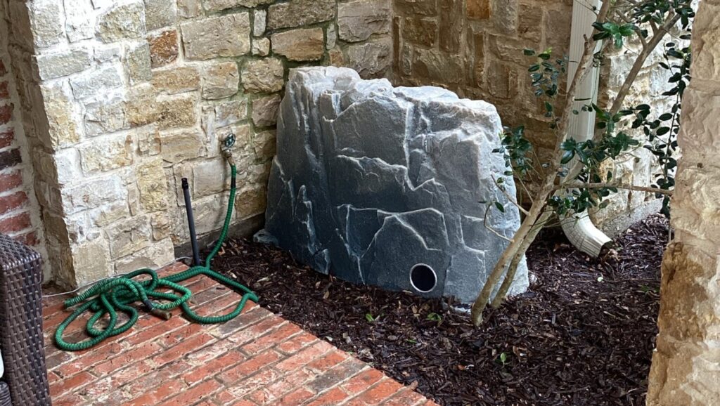 Water shutodd valve under decorative rock cover